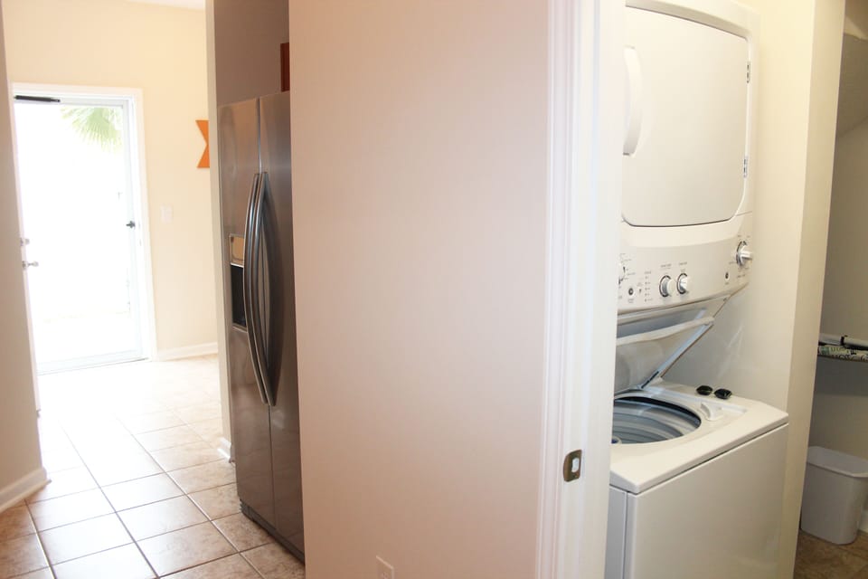 Laundry Room with Washer and Dryer, Stored Beach Umbrella and Beach Chairs