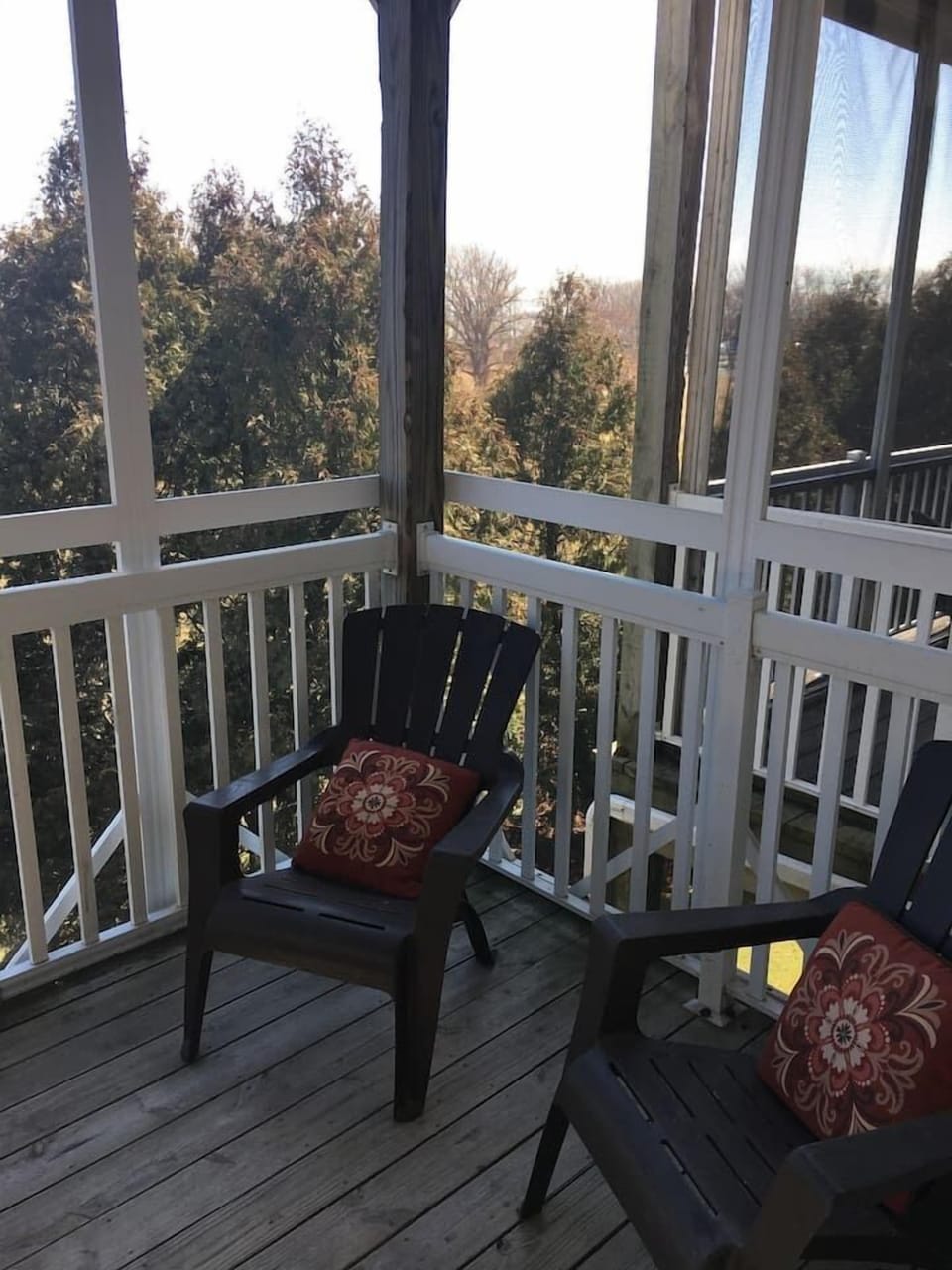 Additional seating on second floor screened in balcony