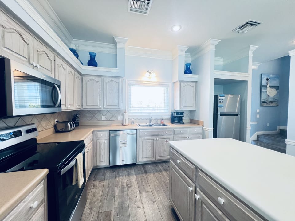 Fully equipped kitchen-cook, dine, and savor your beachside meals. 