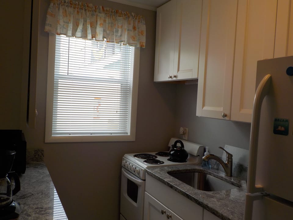 Kitchen(service for 6, pots, pans, serving dishings )some pape products supplied