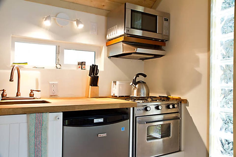 There is a full kitchen