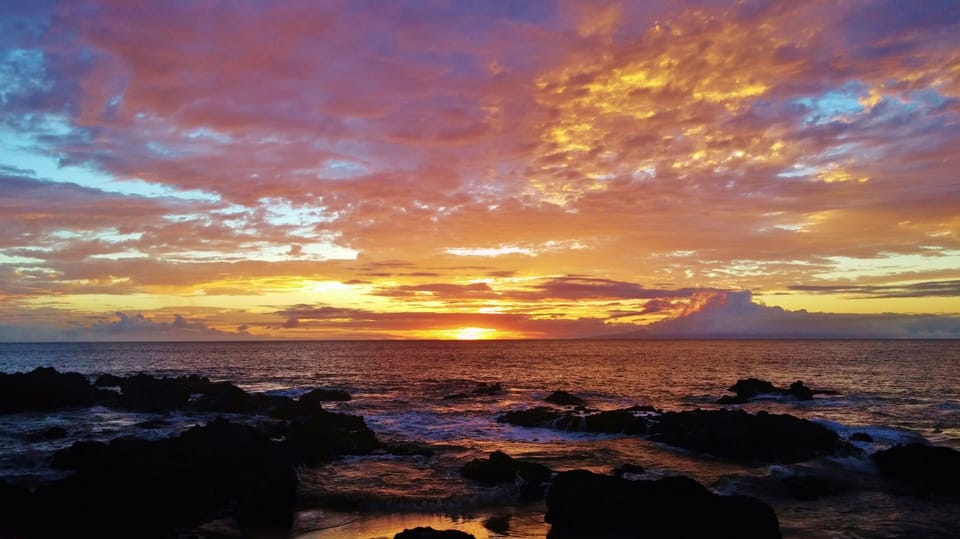 Enjoy one of our spectacular sunsets right across the street at Kalepolepo Beach