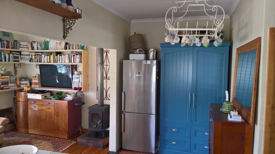 Part of the kitchen and living room area