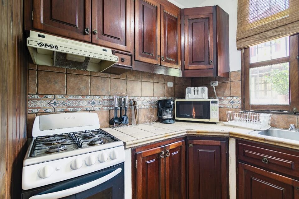 Kitchen, stove and cabinets