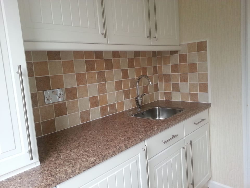 Utility room with washing machine