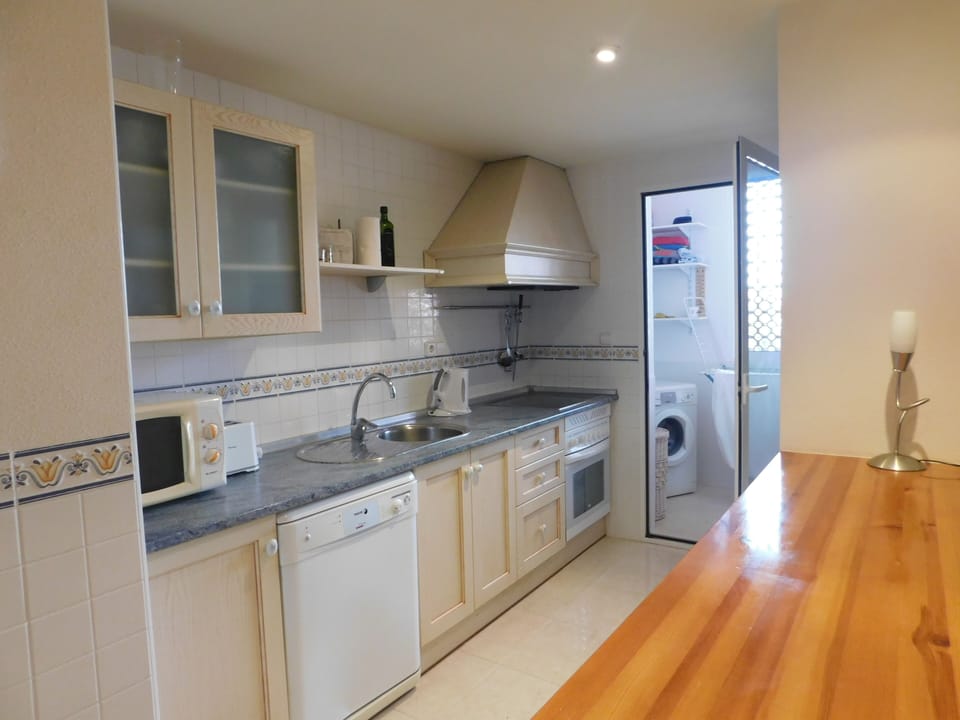 kichen with utility room at the end