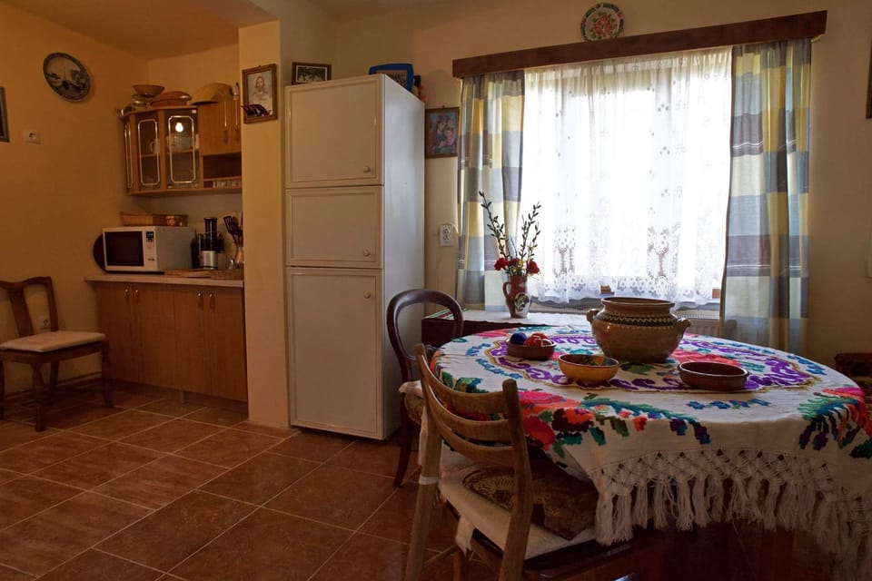 Fully Fitted Kitchen at Casa Carolina leads to the wooden terrace