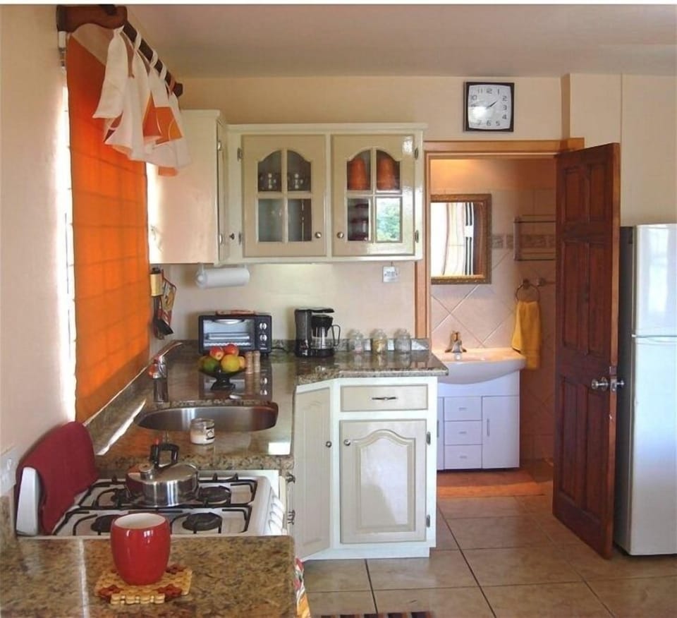 La Marguerite Self-catering Kitchen, With a Sneak Peek of the Bathroom