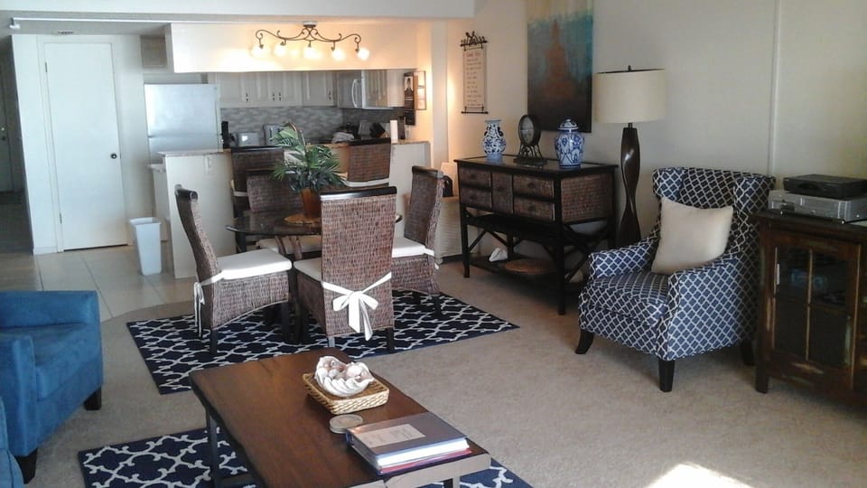 View of the dining area and kitchen in the back