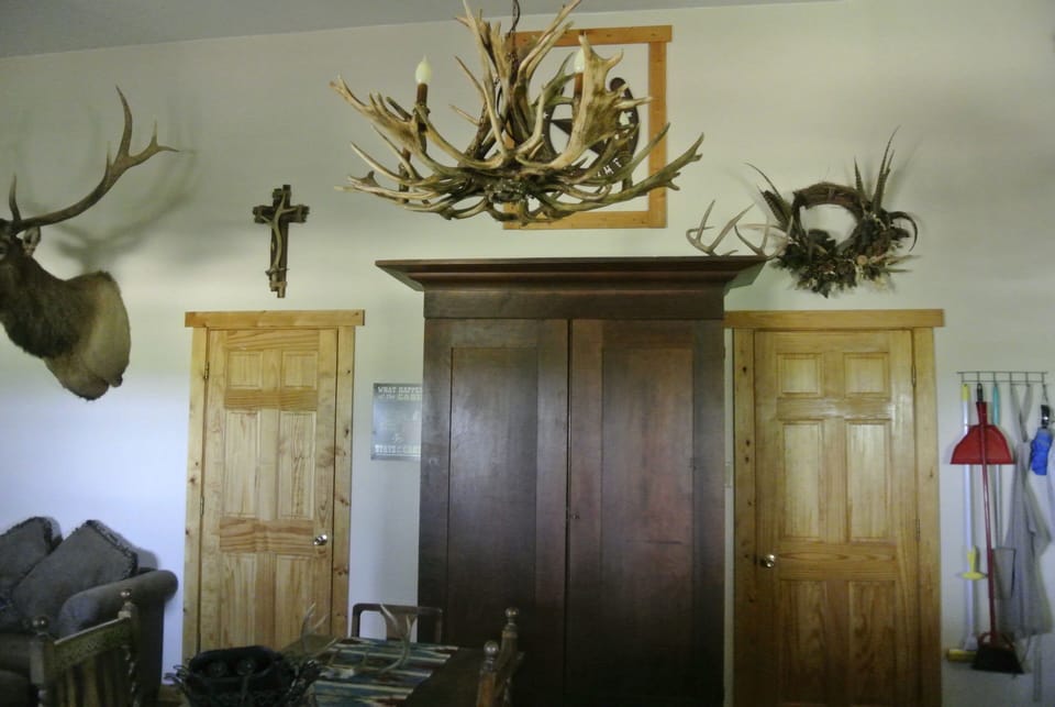 view at front door, left bedroom 1 queen bed, right bedroom 2 (1double & 1 twin)