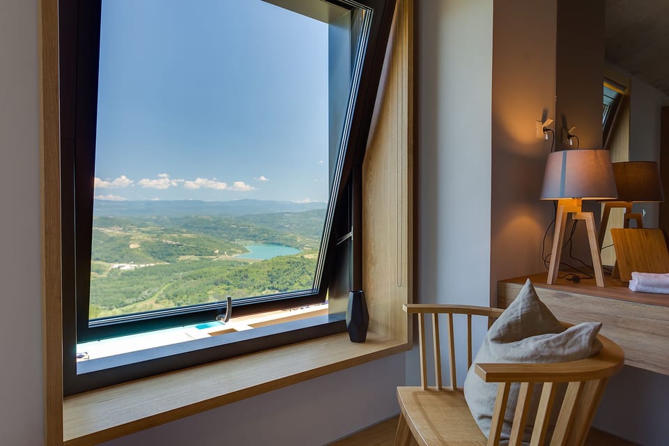 view of the lake from the master bedroom