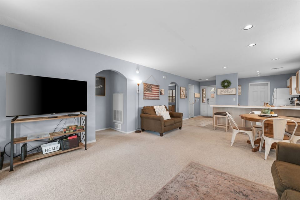 From the TV area to the dining space, the layout stays open and easy to navigate.