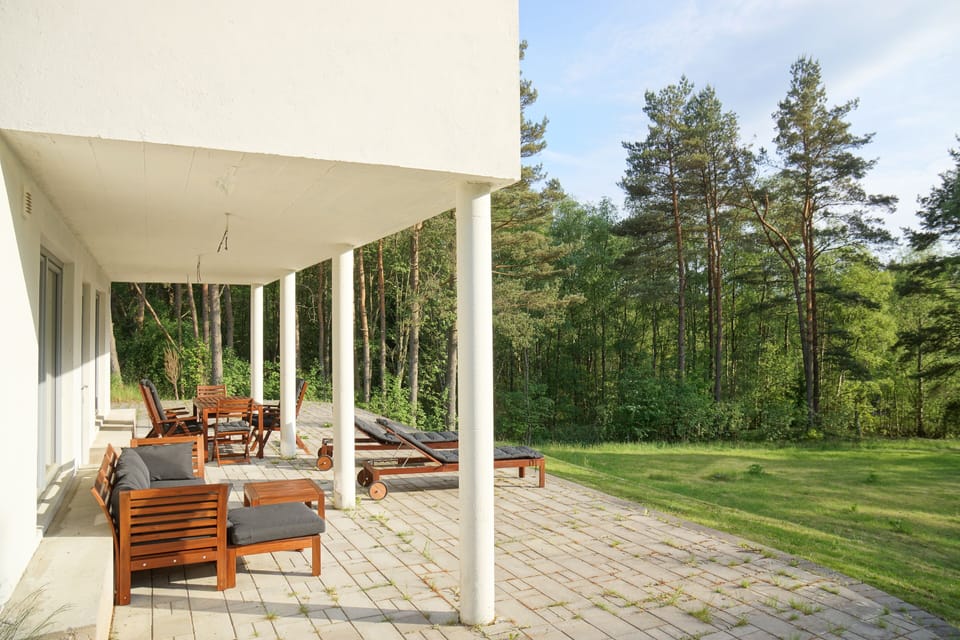 Terrace with table for 12, sofa and benches