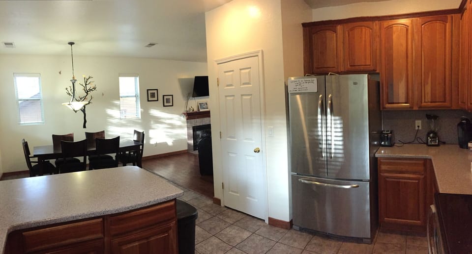 Spacious kitchen is loaded with supplies and nice appliances including a Keurig.