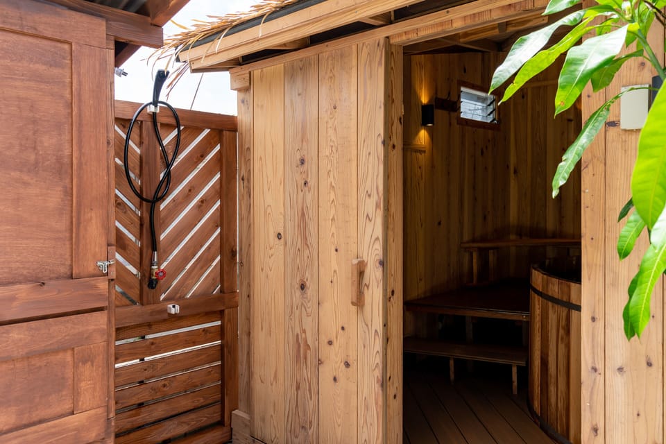 Outdoor shower for rinsing off after spending time at the beach.