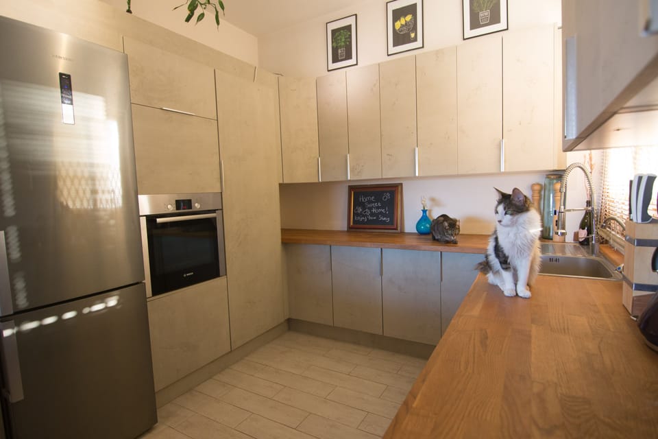 Modern stylish open plan Kitchen with hidden appliances. Everything you need!
