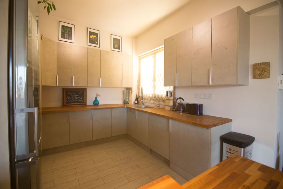 Modern stylish open plan Kitchen with hidden appliances. Everything you need!