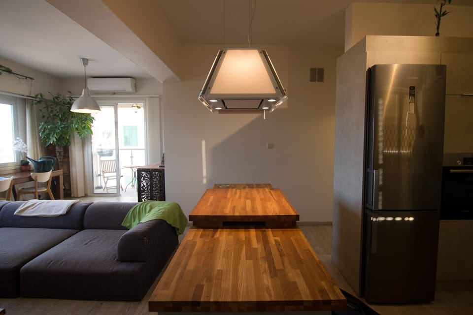 A view of the cooking bench with hidden induction cooker and carbon filter light