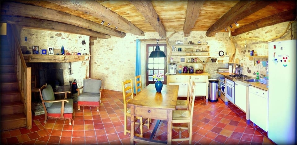 Modern yet traditional kitchen with fireplace