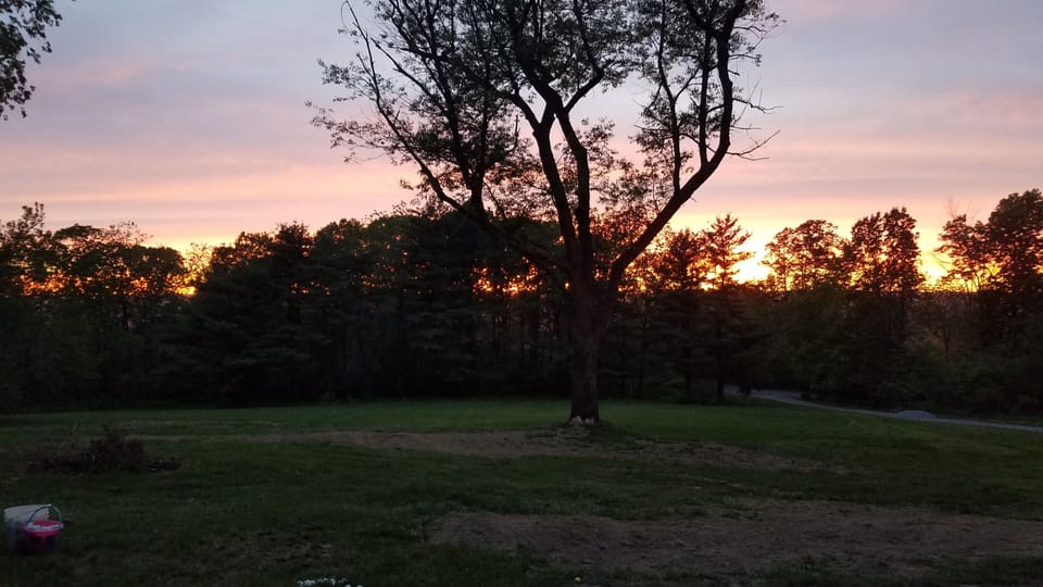 sunset from driveway before yard reconstruction