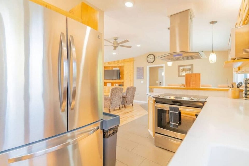 Full Kitchen with Stainless Steel Refrigerator and Oven