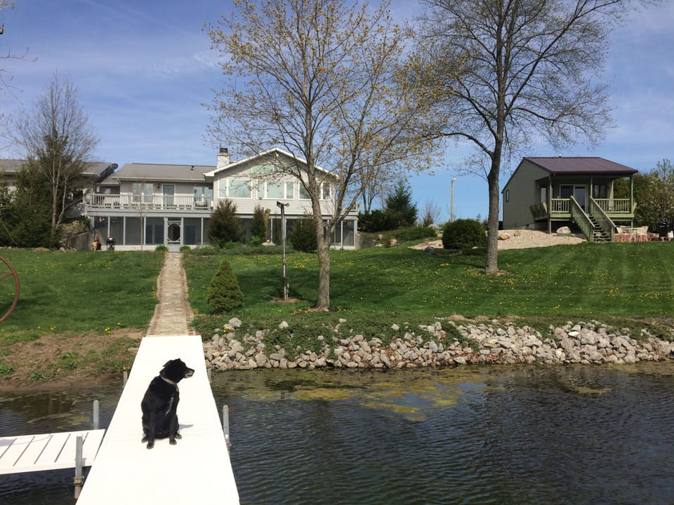 Lodge & Pines Cabin from the main dock. Lodge guest area is behind screen porch.