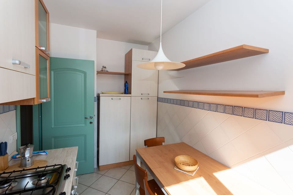 The piece of forniture in the kitchen with fridge,freezer and useful space     