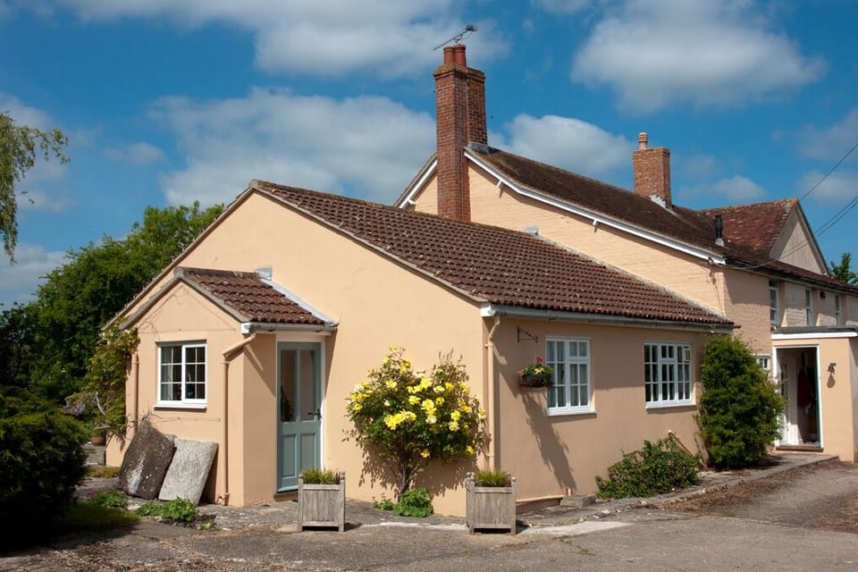 The annexe has it's own porched access from the outside.