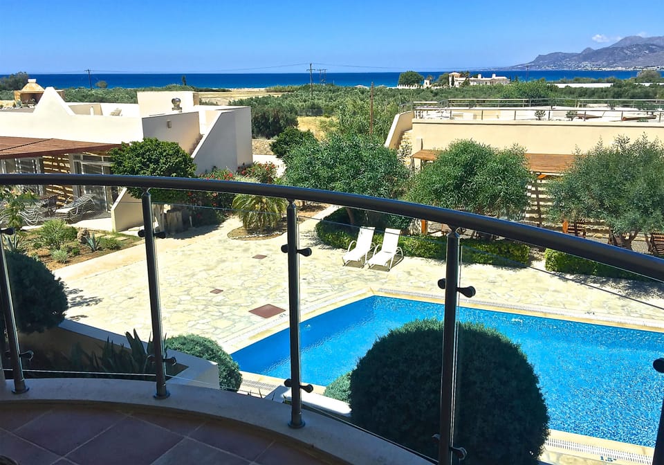 View of bay and mountains from townhouse balcony.
