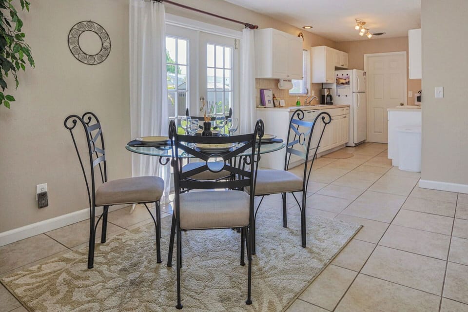 Galley kitchen open to living area - dining area seats 4