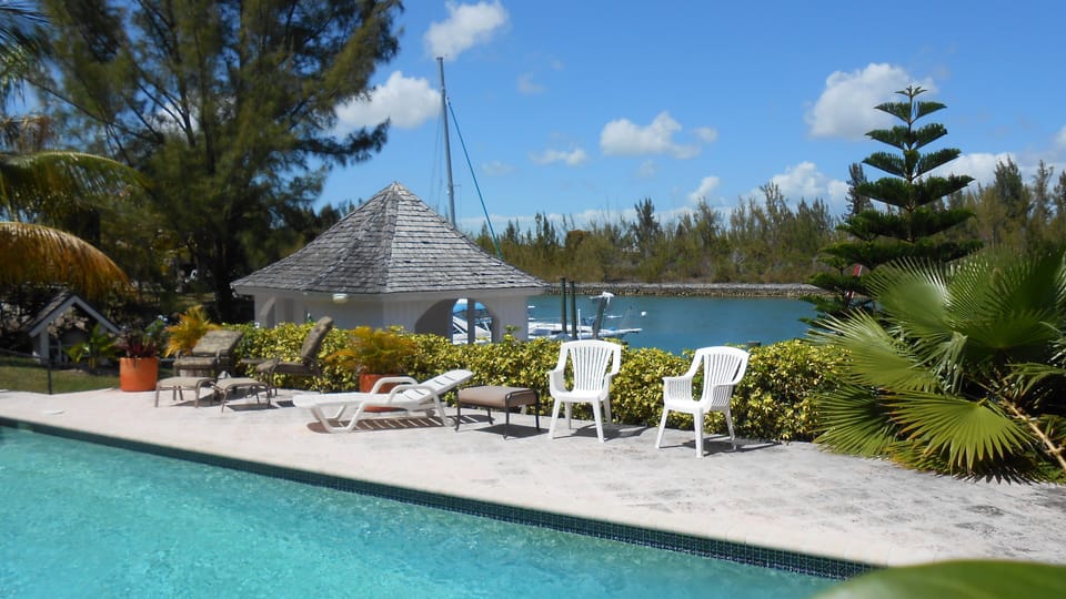 Backyard pool side & ocean canal