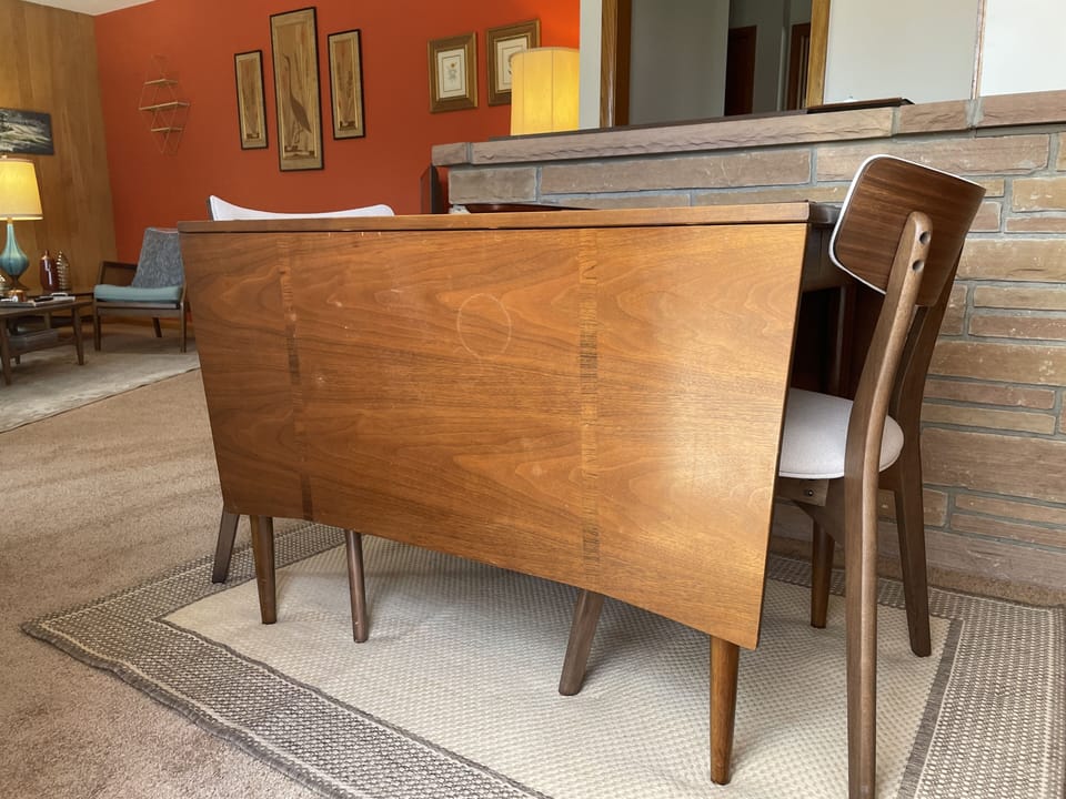 Dining table set for two. It expands and more chairs are available.