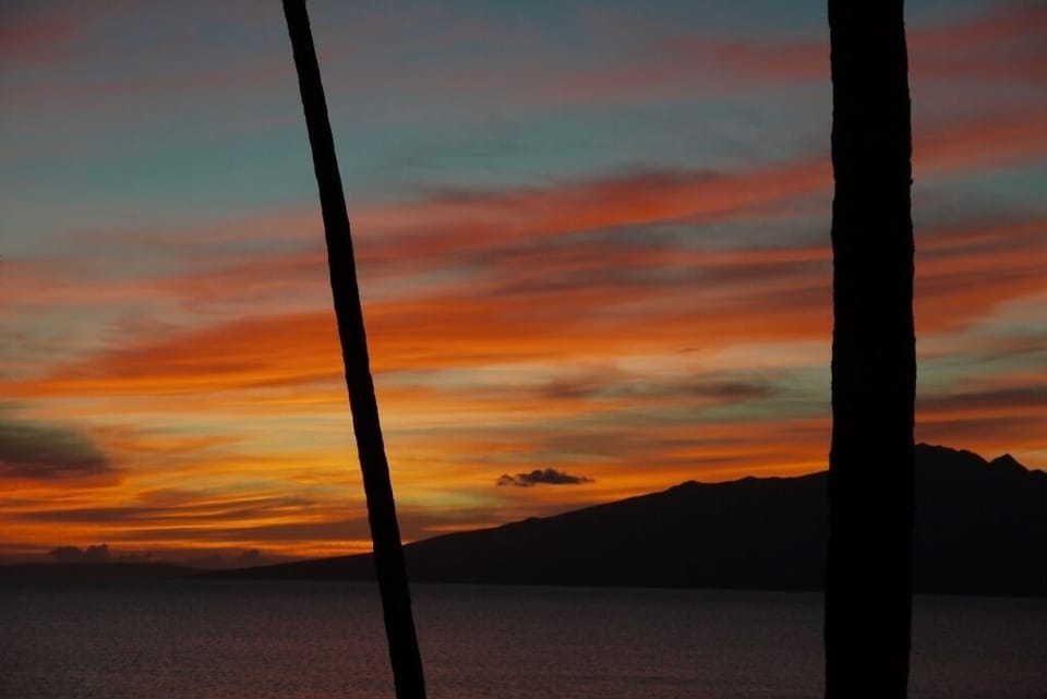 WOW! Sunset view of the island of Moloka'i as seen from our lanai...