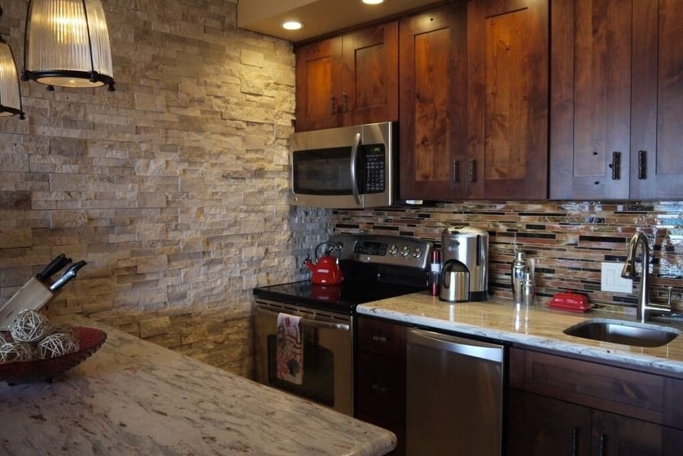 Fully equipped kitchen in case you don't want to leave the condo and the view...