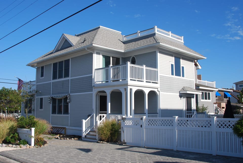 Driveway. Pool behind the white fence. 27 5th street. Taken from 5th street. 