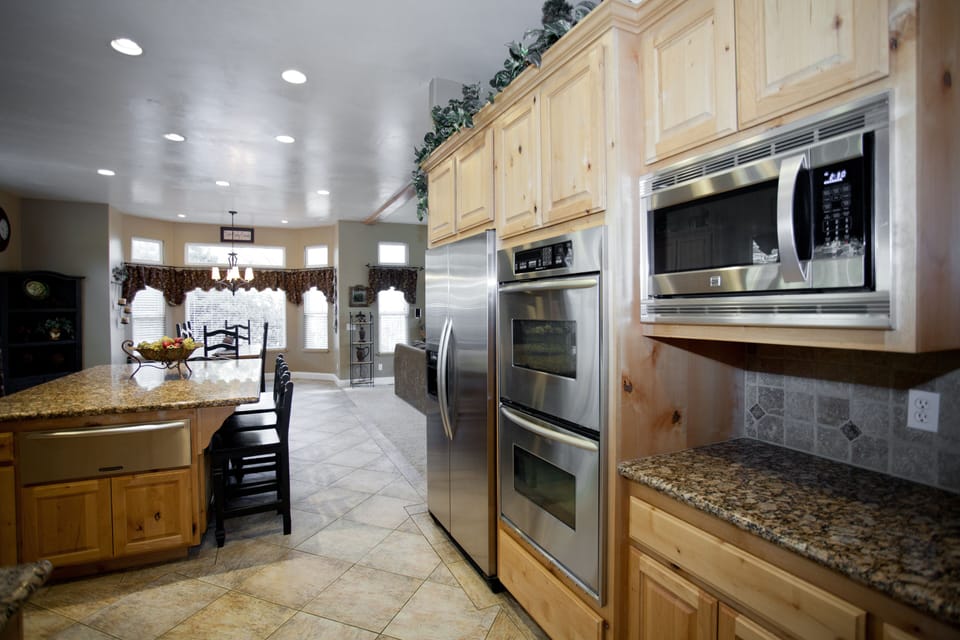 High end stainless steel appliances including a double ovens and warming drawer