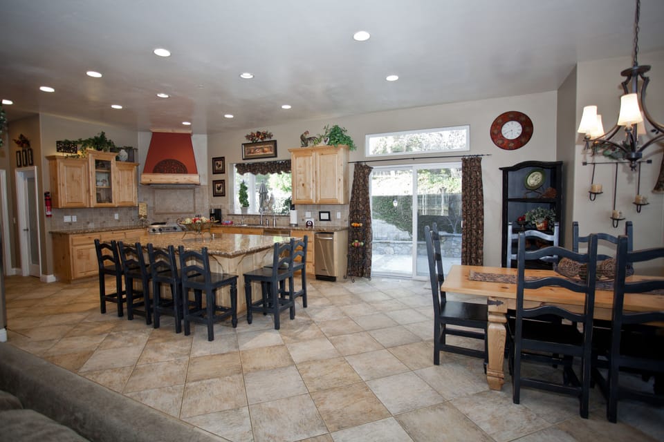 Extra large kitchen with large island that seats 6 and dining table that seats 6