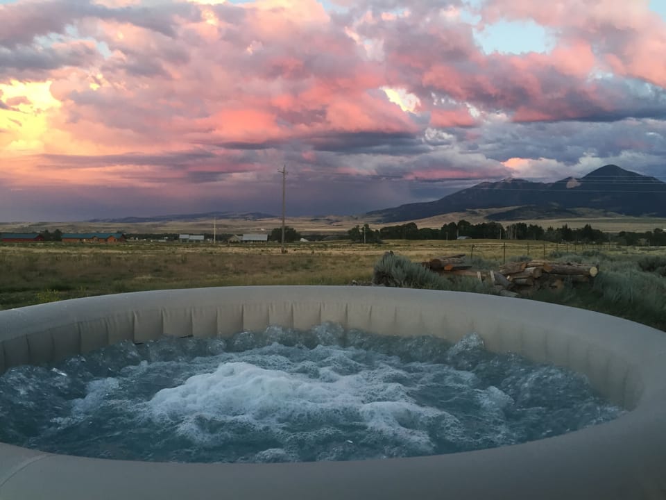 Hot tub with a view! Trees and privacy fence have been added...