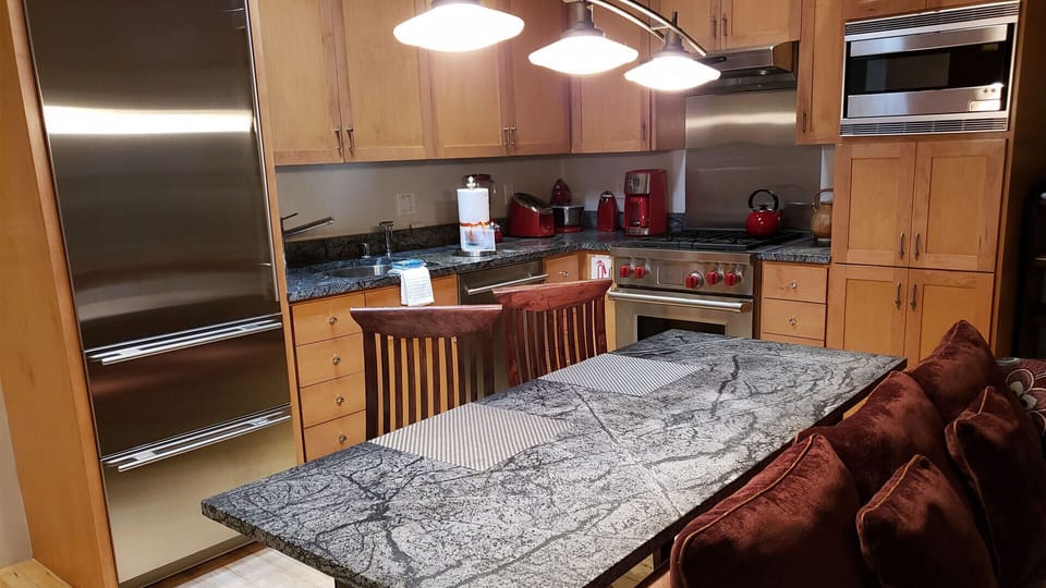 Another kitchen and dining area view.