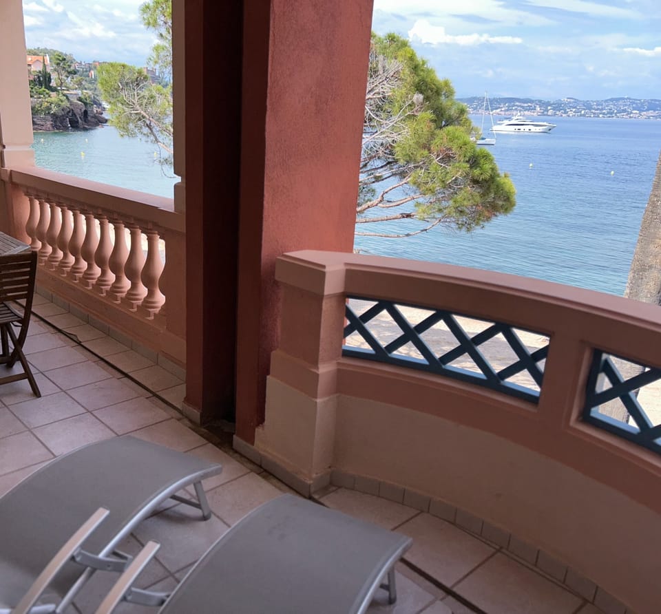 Large Balcony Terrace w dining table and lounge chairs. 3rd Floor