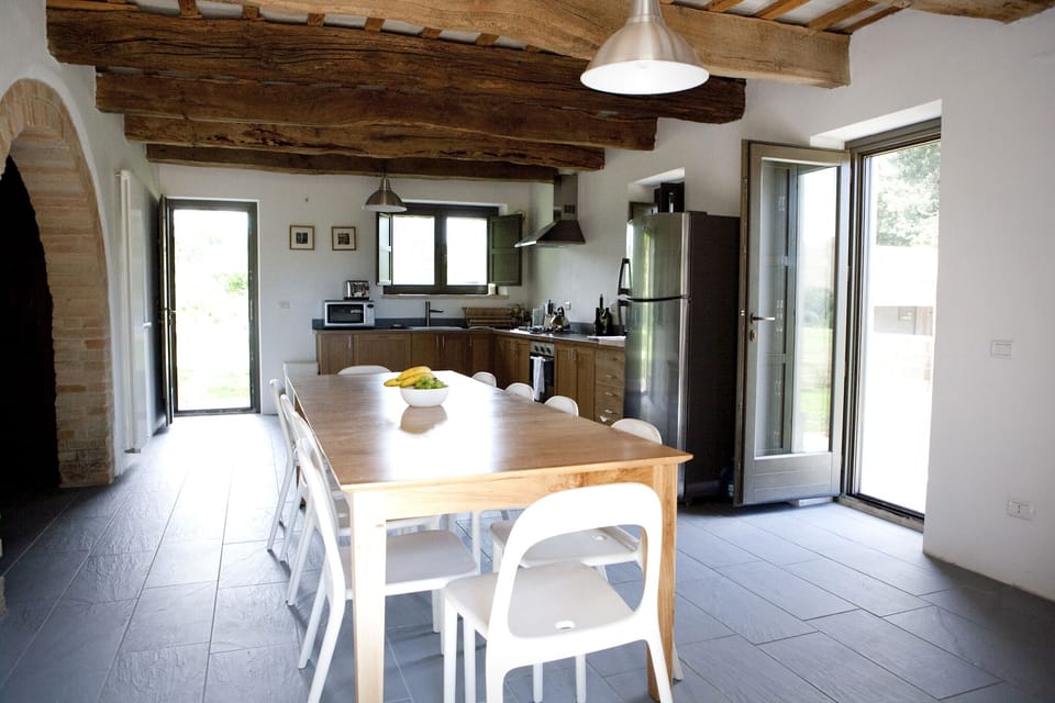 Dining space for ten people plus highchair