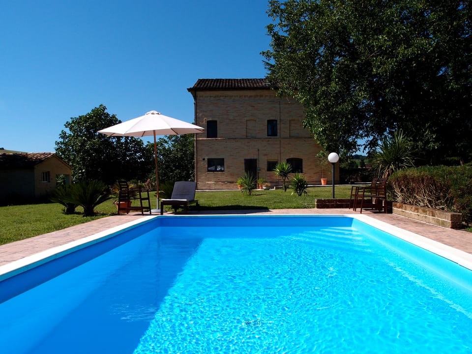 The pool sits in the pretty private garden 
