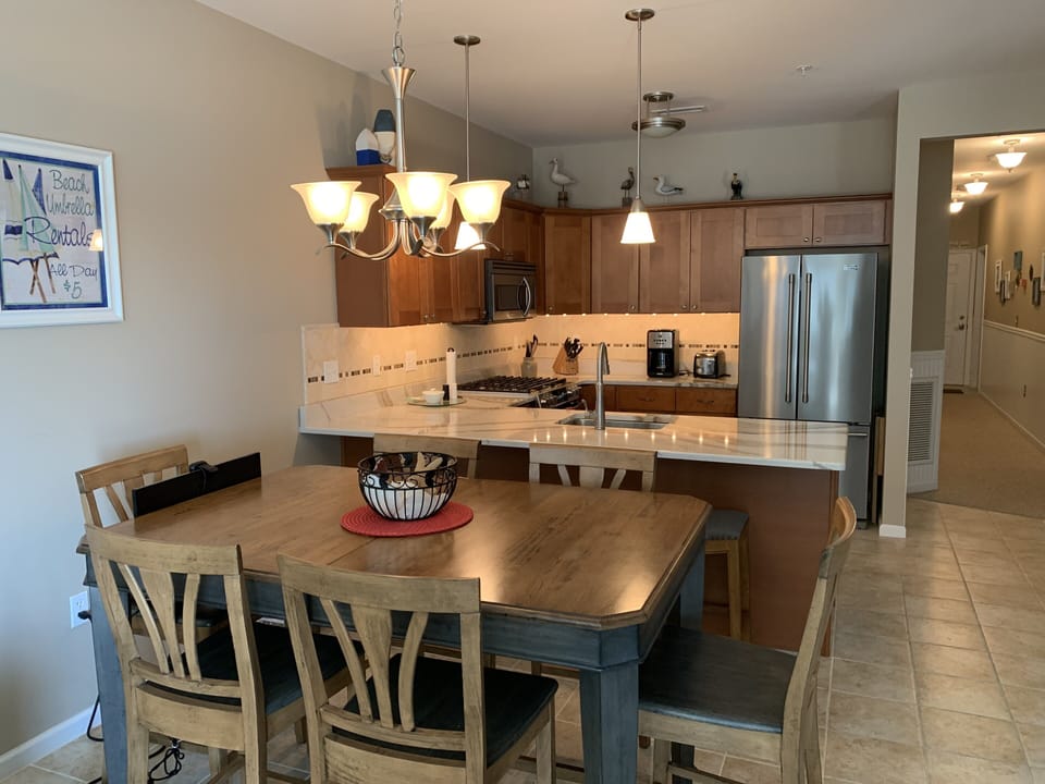 Plenty of dining room with an expandable dining table comfortably seating eight.