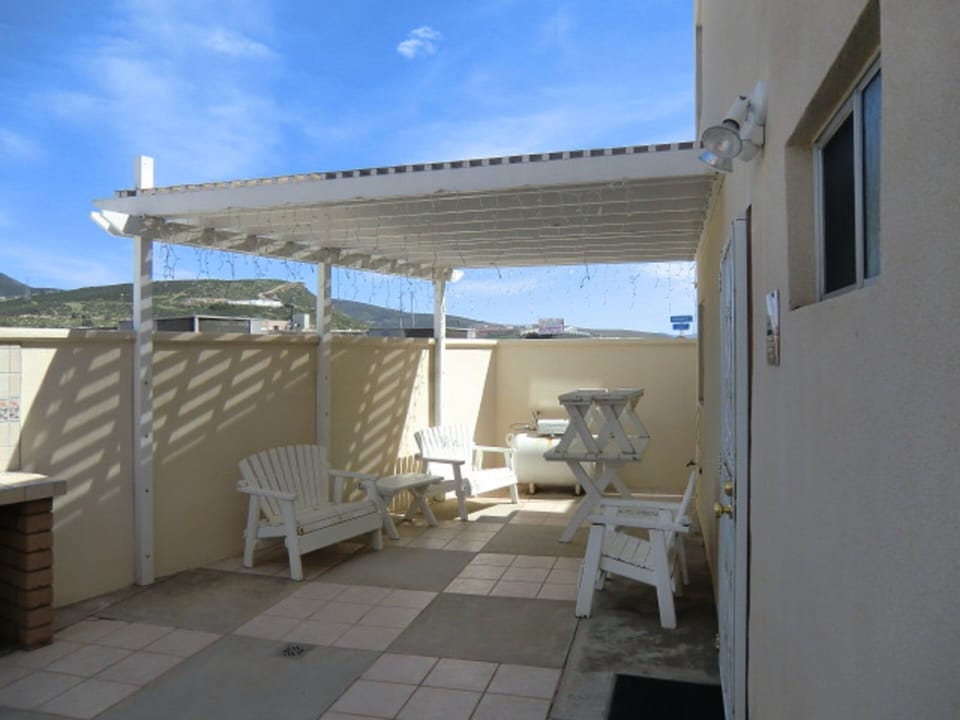Backyard Awning area with seating