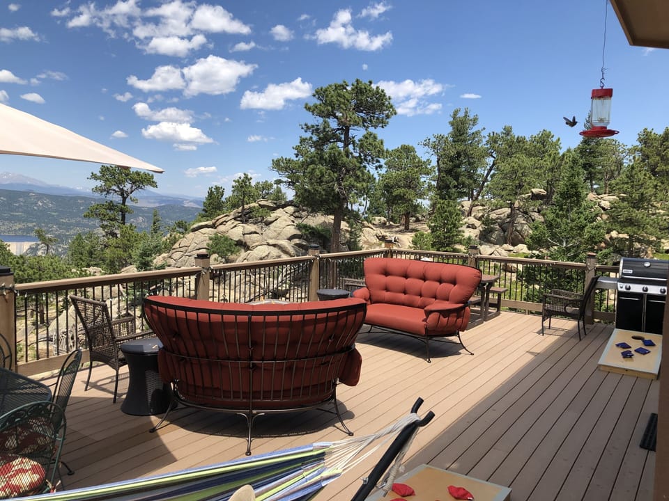 Large deck, fire pit, table and chairs, natural gas grill, views every direction
