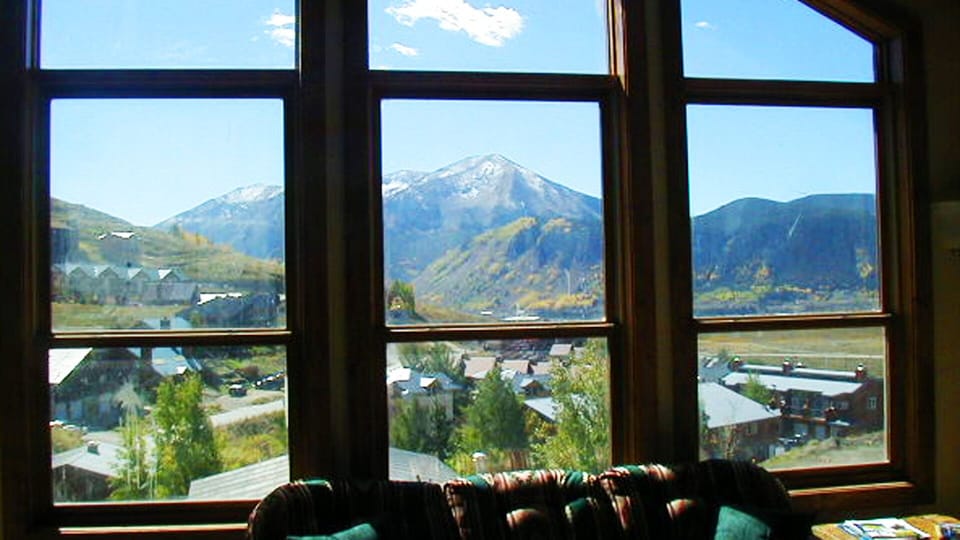 three story windows to look out at cb from the living room
