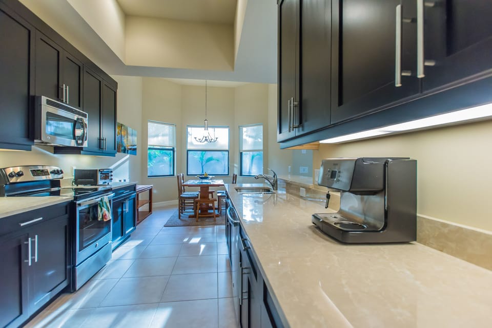 Italian Creme Marble Tops Throughout! Modern Appliances, fully loaded!