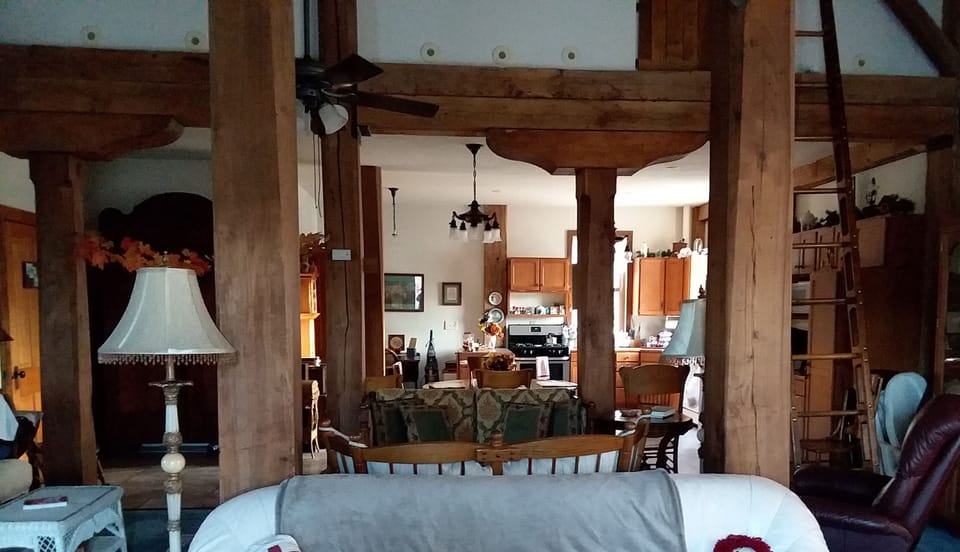 Living area in center front. Dining area & kitchen under dropped ceiling at rear