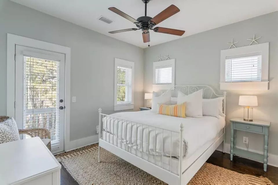 Bright third floor suite with attached reading porch. 