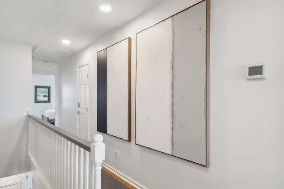 Stairs up to 3rd floor with custom art
